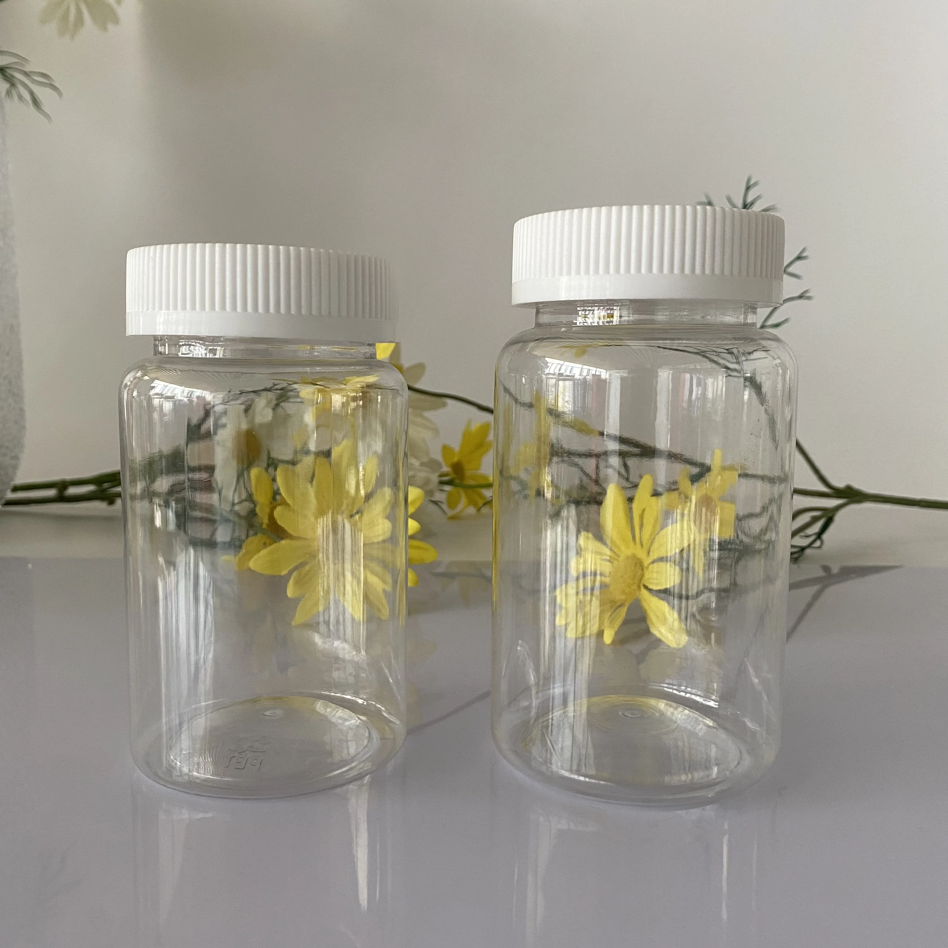 Sales food grade 150cc 175cc200cc250cc300cc  PET transparent empty candy can be used for the packaging of soft candy bottles 200