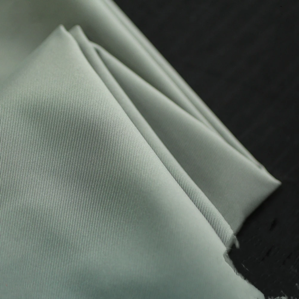 Factory Hot Sale High Quality T400 fiber Soft Shell 100% Polyester Spun Memory Fabric For Garment