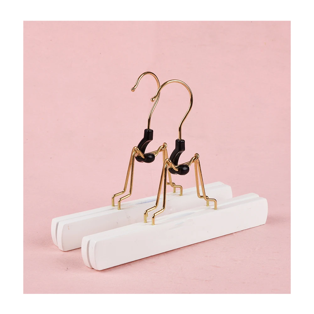 Clothing store white skirt hanger hair extension hanger