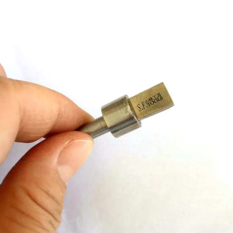 Multi-point diamond trimmer for grinder wheels