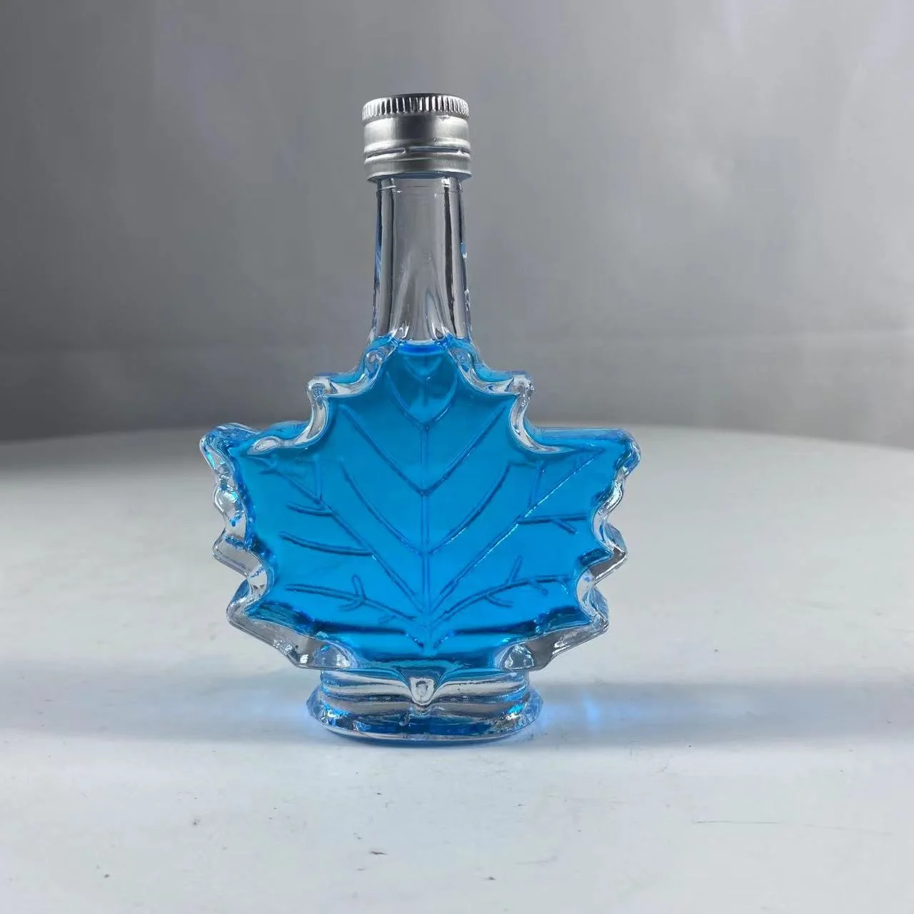50ml 100ml 250ml transparent maple leaf glass bottle for syrup,honey use