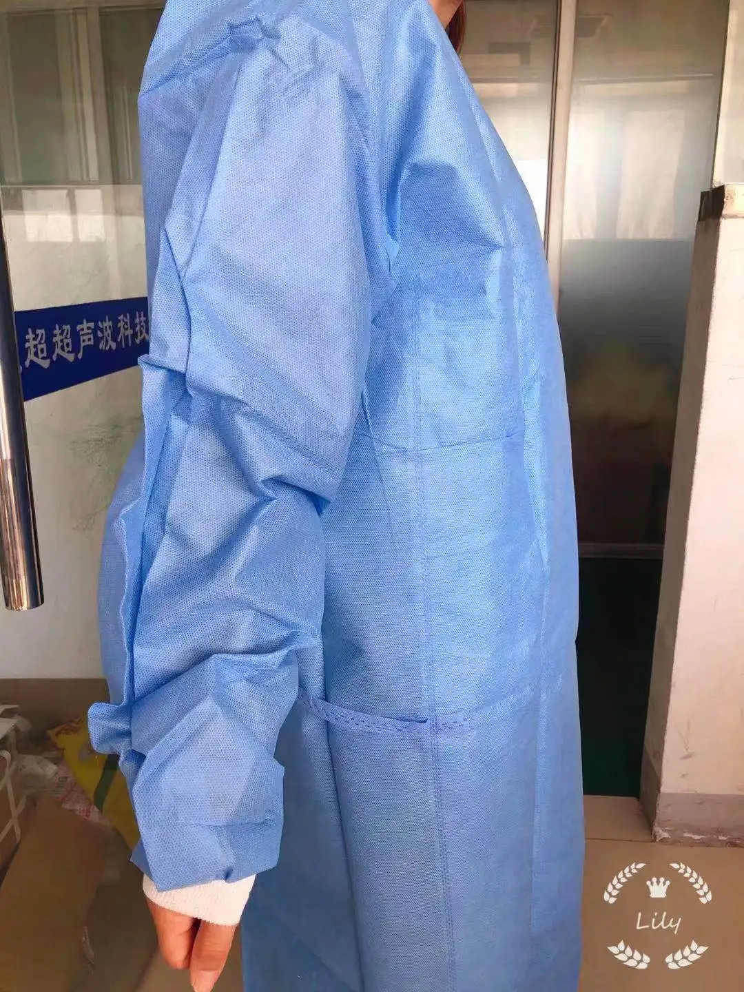 Surgical gown sewing machine