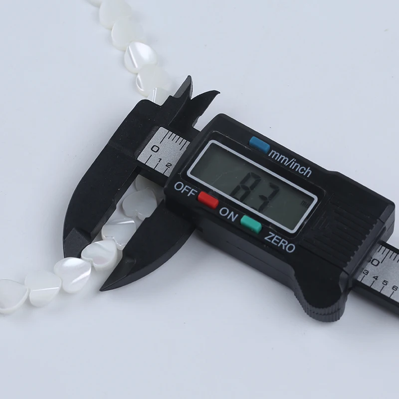 Zhuji Wholesale 8-9mm White Shell Of Love Shape For Diy Jewelry Making