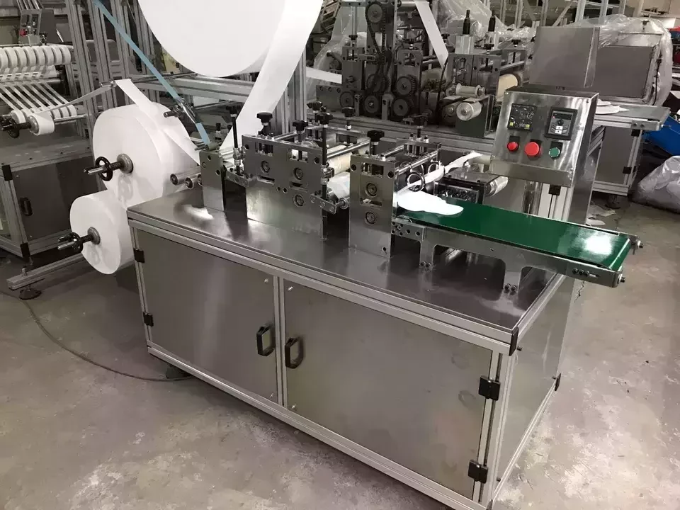 China Automatic Professional Ultrasonic Sanitary Pads Making Machine Feminine Sanitary Napkin Machine