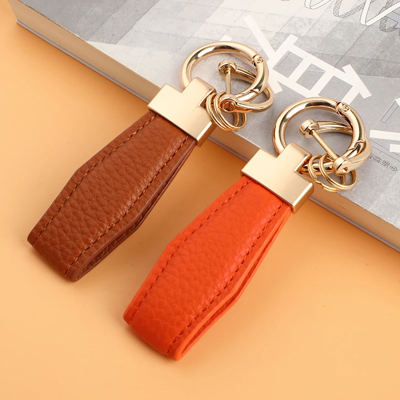 High Quality Factory Custom Wholesale Leather Car Logo Metal Embossed Keychain Zinc Alloy Keychain