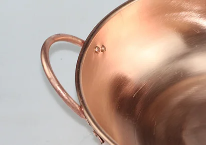 Chinese traditional handmade copper pots and non stick pans use on home restaurant kitchen cooking