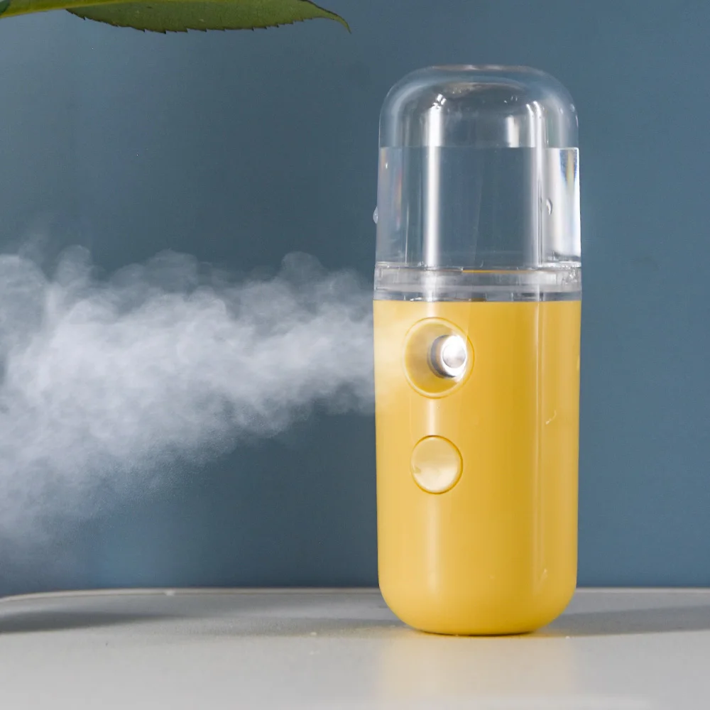 Бесплатный образец устройства красоты Электрический портативный нано отпариватель лица мини спрей для лица бутылки