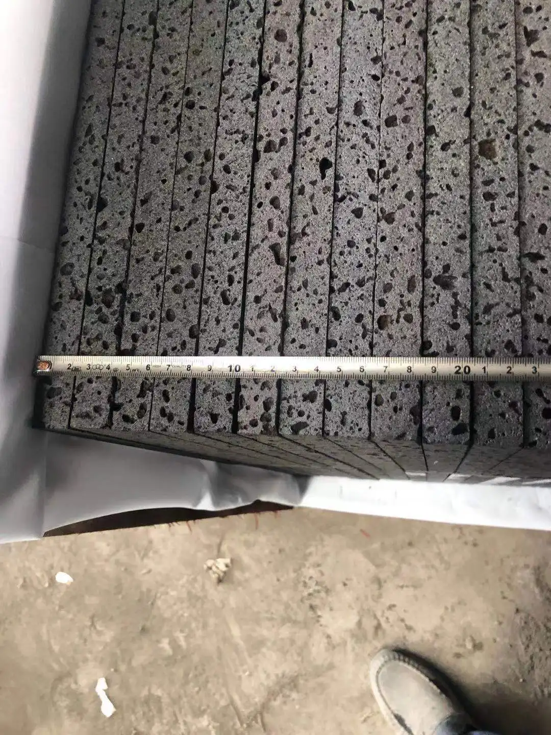 Customized Honed Finish Big Hole Type China Volcanic Black Basalt Lava Stone Slabs And Tiles