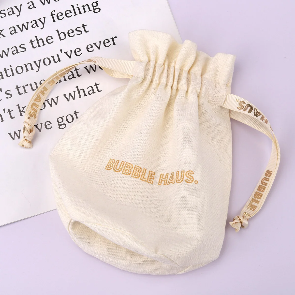 Custom Gold Logo Round Bottom Cotton Linen Candle Packing Gift Bag Drawstring Candle Pouch With Ribbon