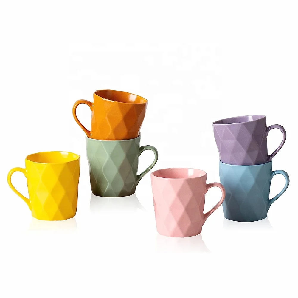 Best selling color glazed embossed design ceramic coffee mugs porcelain mugs for coffee and water, tea