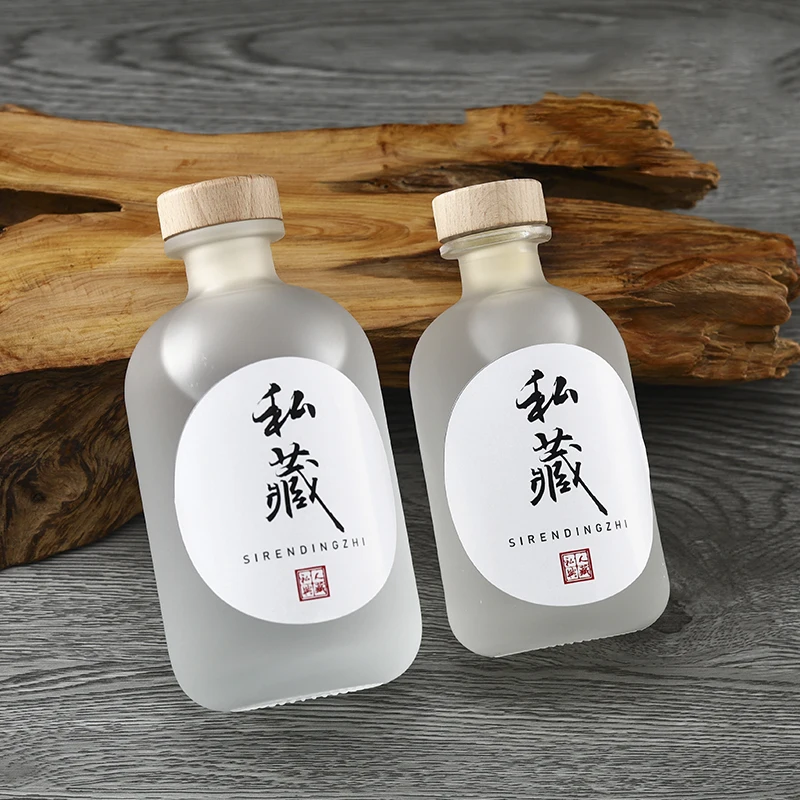 Hot Selling 500ml round shape Spirits  Bottles Clear frost  Empty Whiskey Gin Vodka Glass Bottle with Wine Label