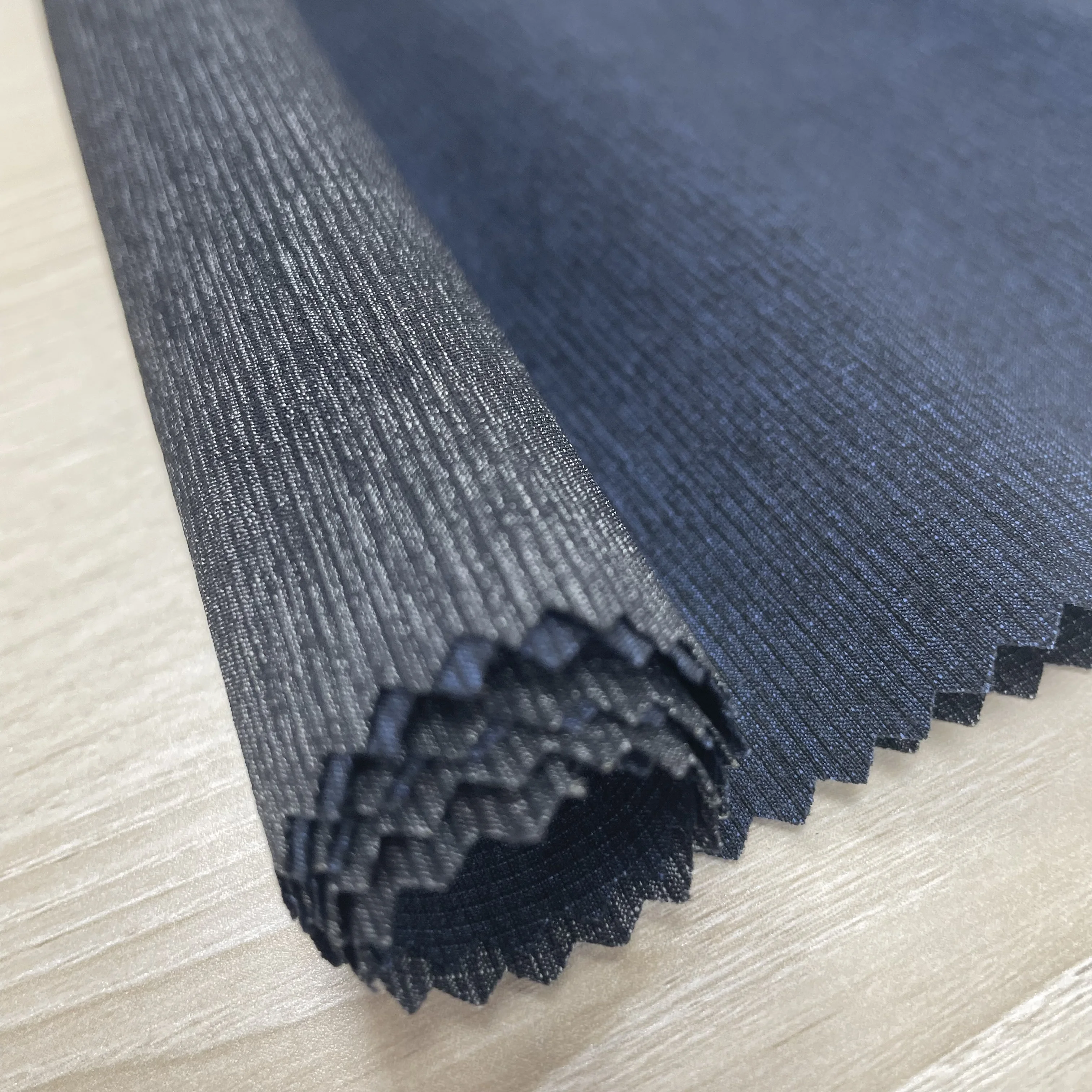 45% Nylon 45% Polyester 10% Spandex 0.15 Ribstop 4 Way Stretch Fabric