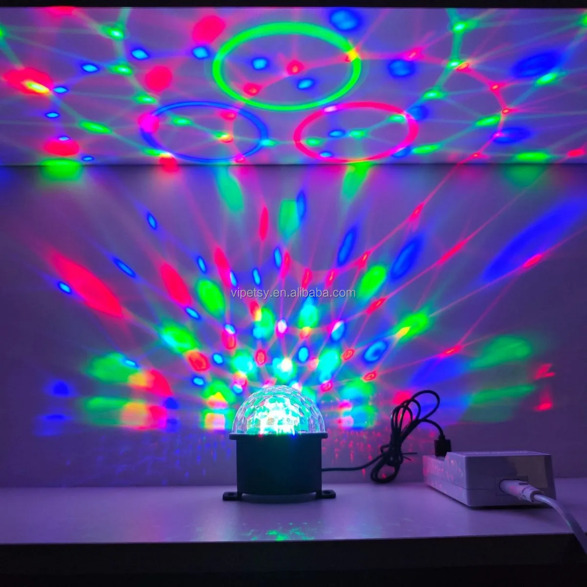 Factory direct sales DJ speaker mini dynamic atmosphere light remote control disco light magic ball light laser projector
