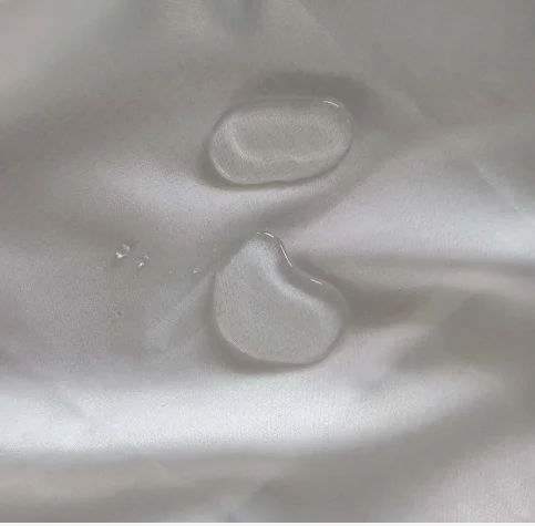 
PE film polyester taffeta woven fabric for Disposable civil protective clothes 