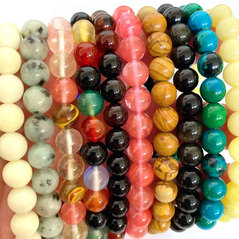 Wholesale natural crystal bracelets seven chakra beads for bracelet making .