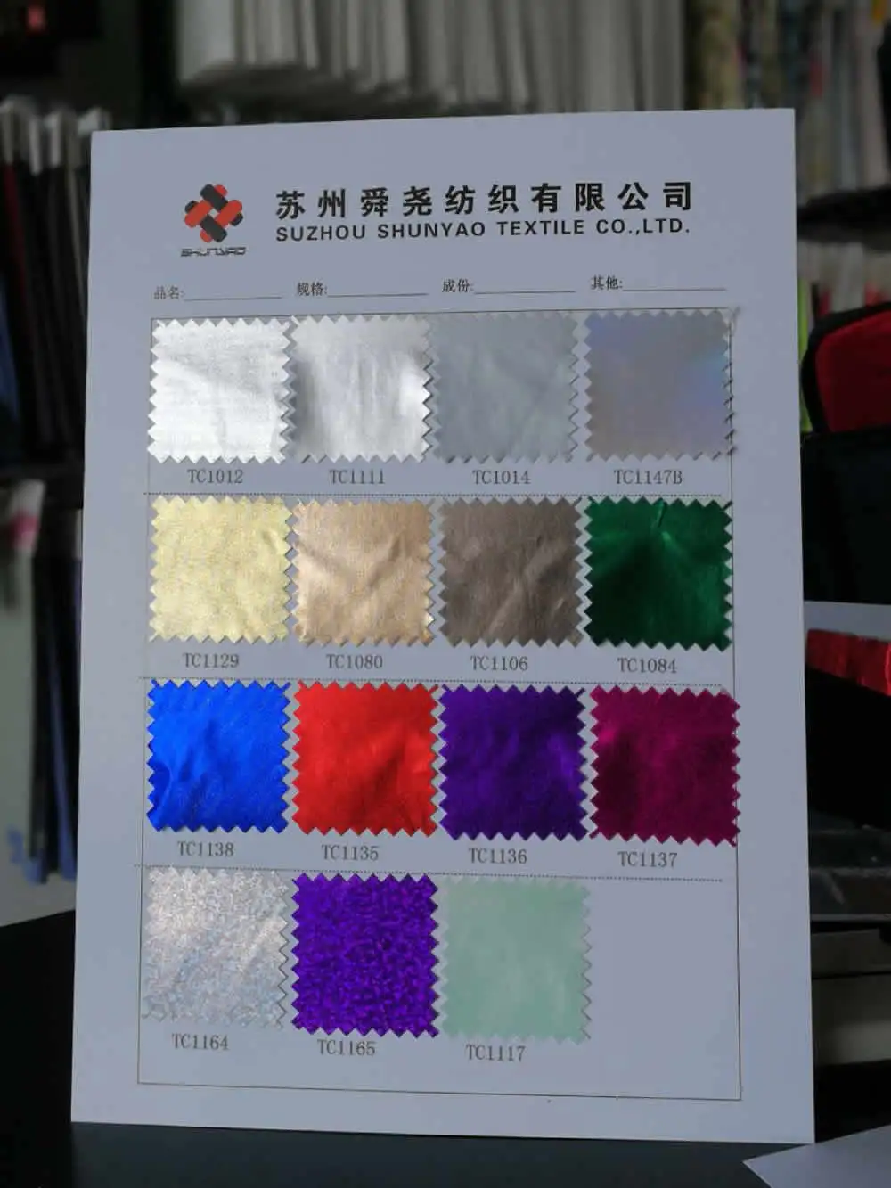 100% polyester foil coated shiny silver glitter fabric