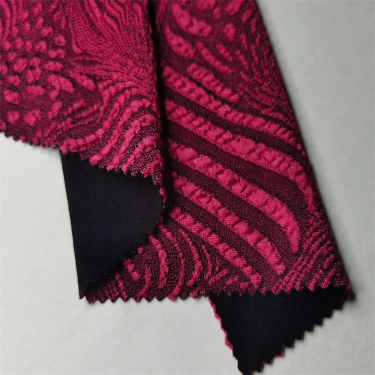 Bright rose madder color 3D abstract design jacquard dyed knitting fabrics for women