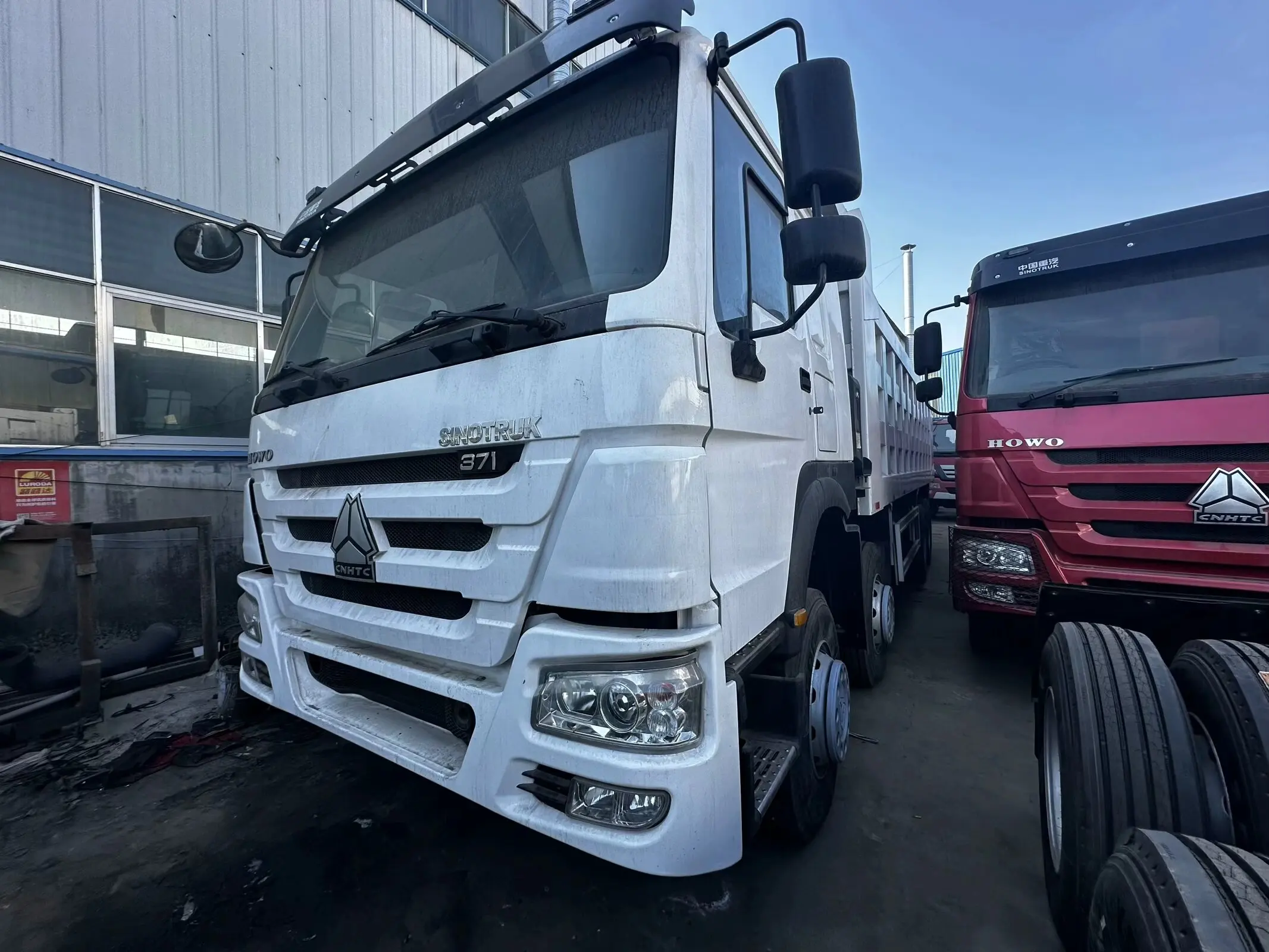 2021 КИТАЙСКИЙ Sinotruk Howo с двумя ручками 8x4 371 л.с. экономичным самосвал для загрузки.
