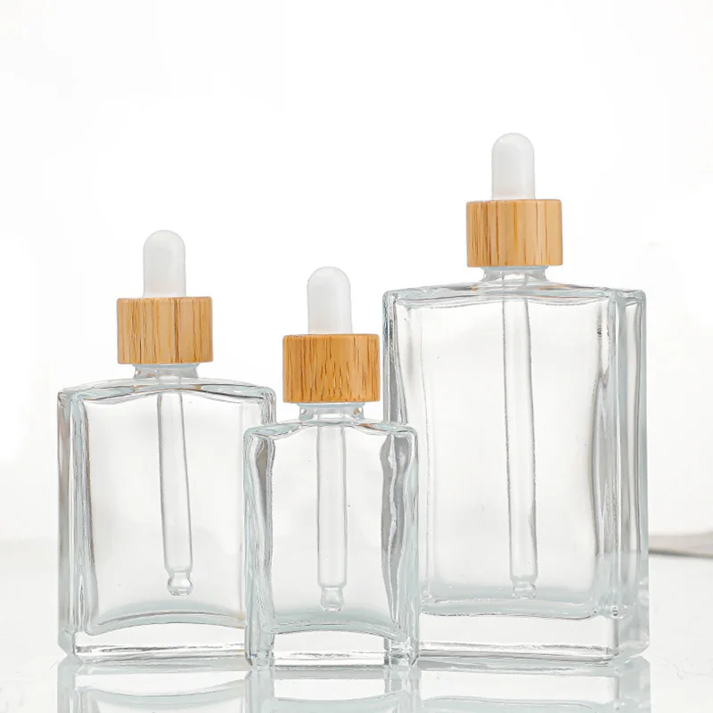 Transparent 30ml 50ml 100ml Flat Square Cosmetic Serum Essential Oil Glass Dropper Bottle with Bamboo Cap