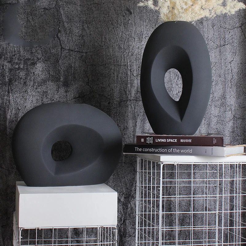 Simple modern style ceramic vase Oval ceramic ornament Frosted black and white home sample room vase decoration