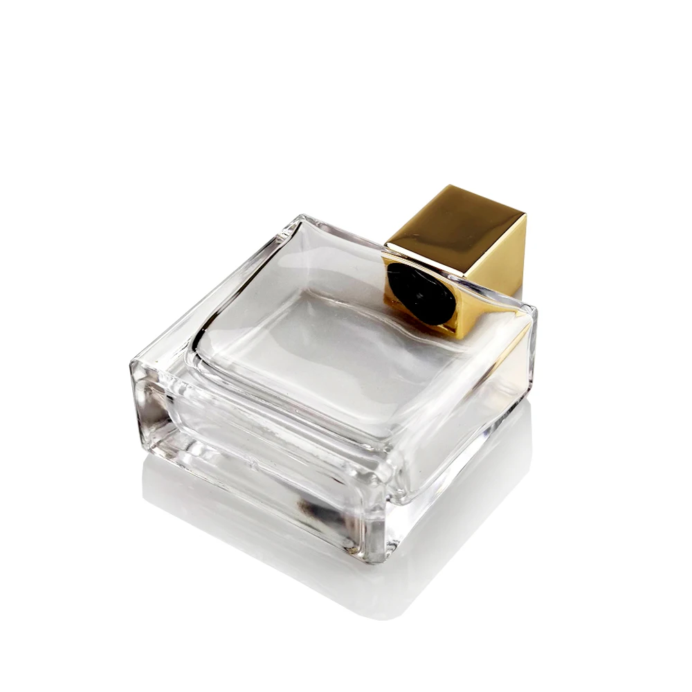 Customised logo on top side 15 fea tall cube shaped luxury shiny gold metal zamak perfume bottle cap