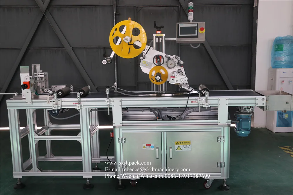SKILT Automatic empty bag labeling machine label applicator with feeder manufacturer