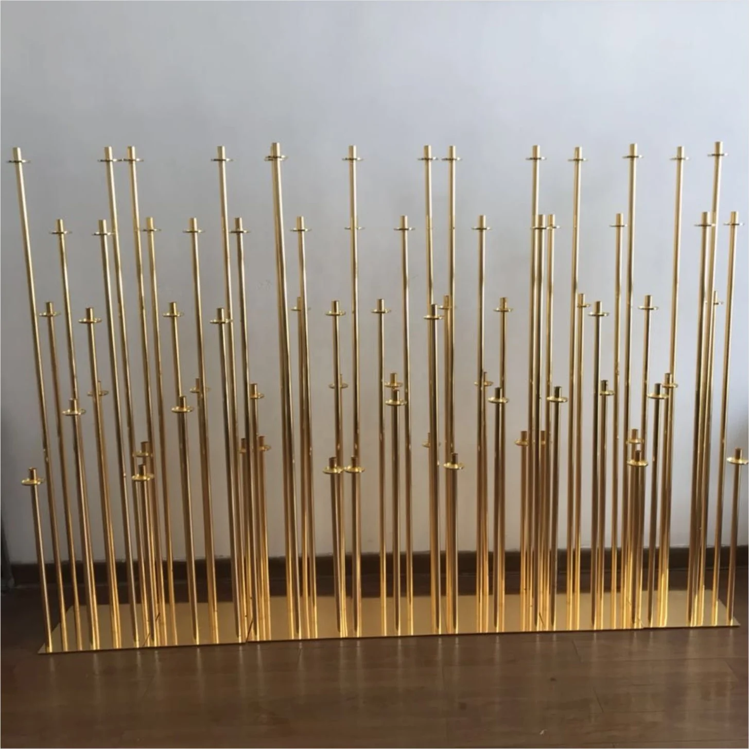 Beautiful gold metal candle holder for wedding decorating backdrop