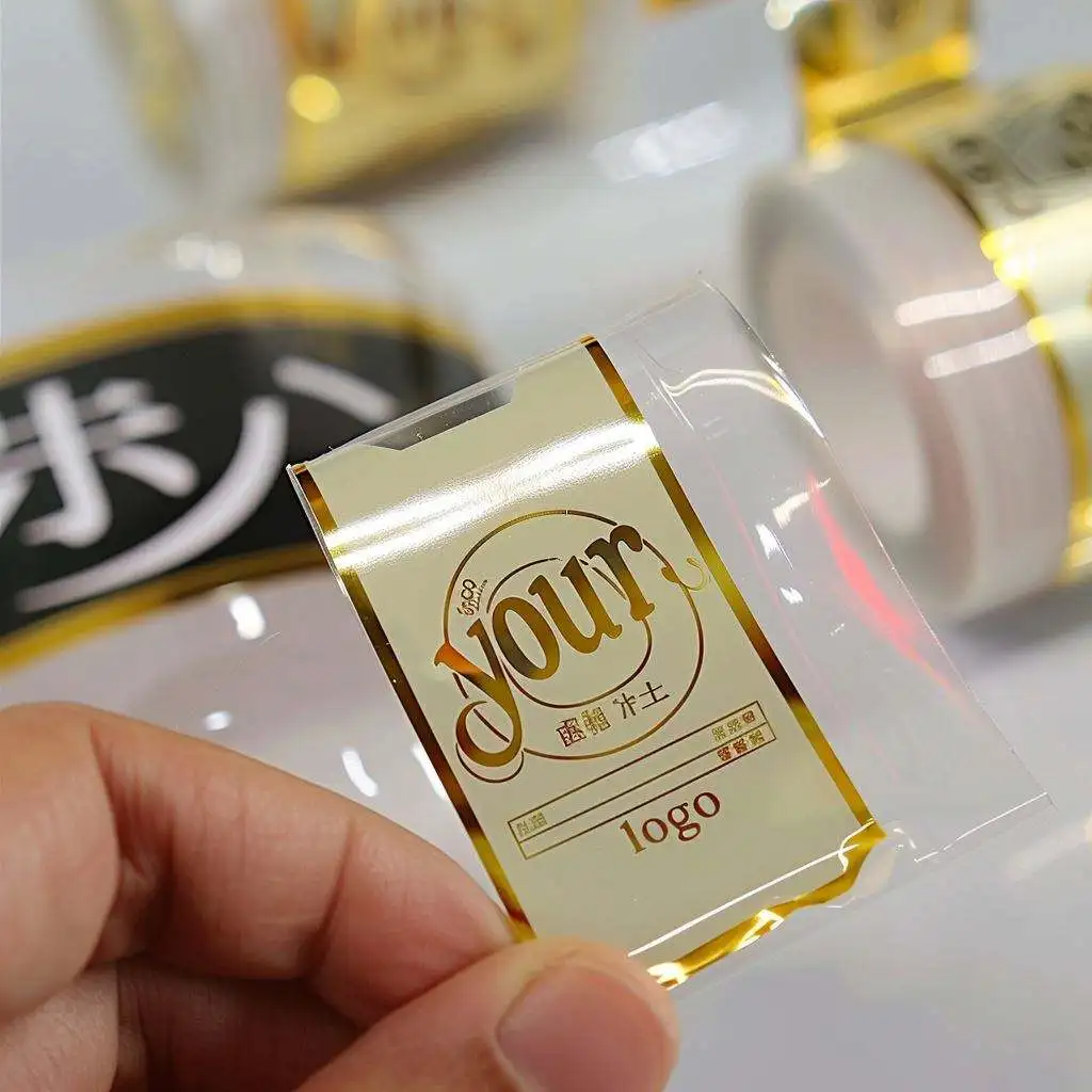 TG007 OEM custom Waterproof Clear embossing hot stamping  transfer Print round Logo gold foil labels stickers for candle