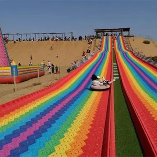 Outdoor rainbow dry snow slide for children and adult to have fun