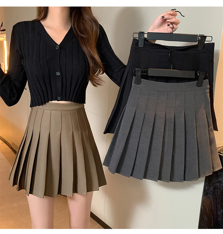 girls in mini Pleated skirt short skirt female new summer anti-glare college wind high cashew solid black a-line skirt