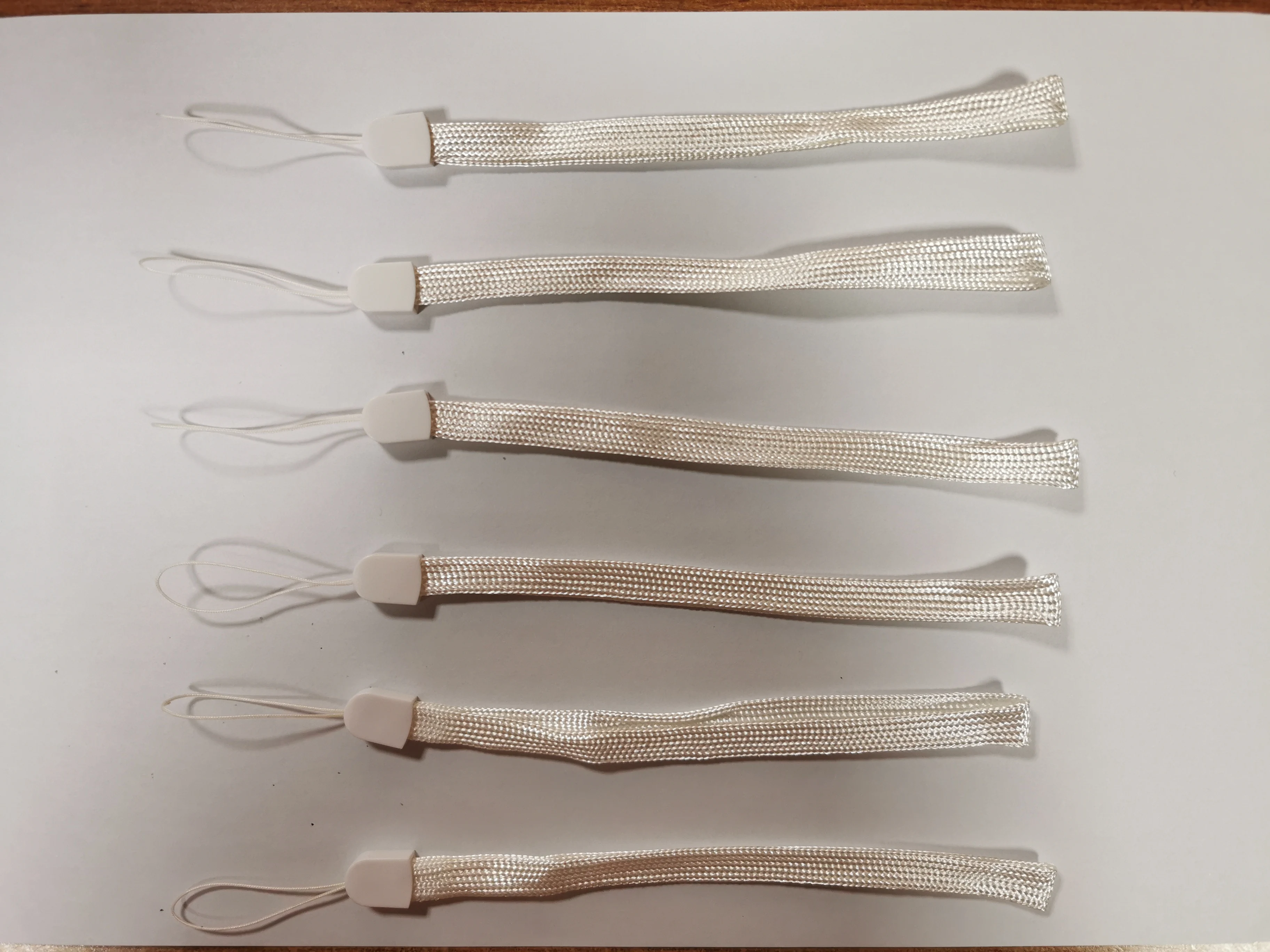 Wholesale high quality white short nylon wrist strap lanyard for speaker light stick water bottle walkie-talkie selfie stick fan