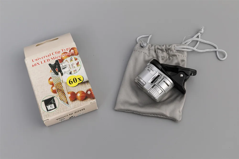 9595 new style Portable LED 60x mini microscope with Currency Detector