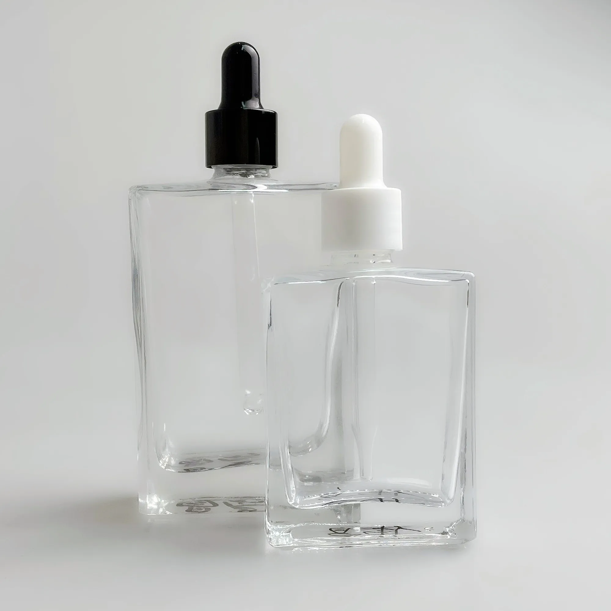 square shoulder dropper bottle new design perfumes square glass dropper bottle clear glass with dropper