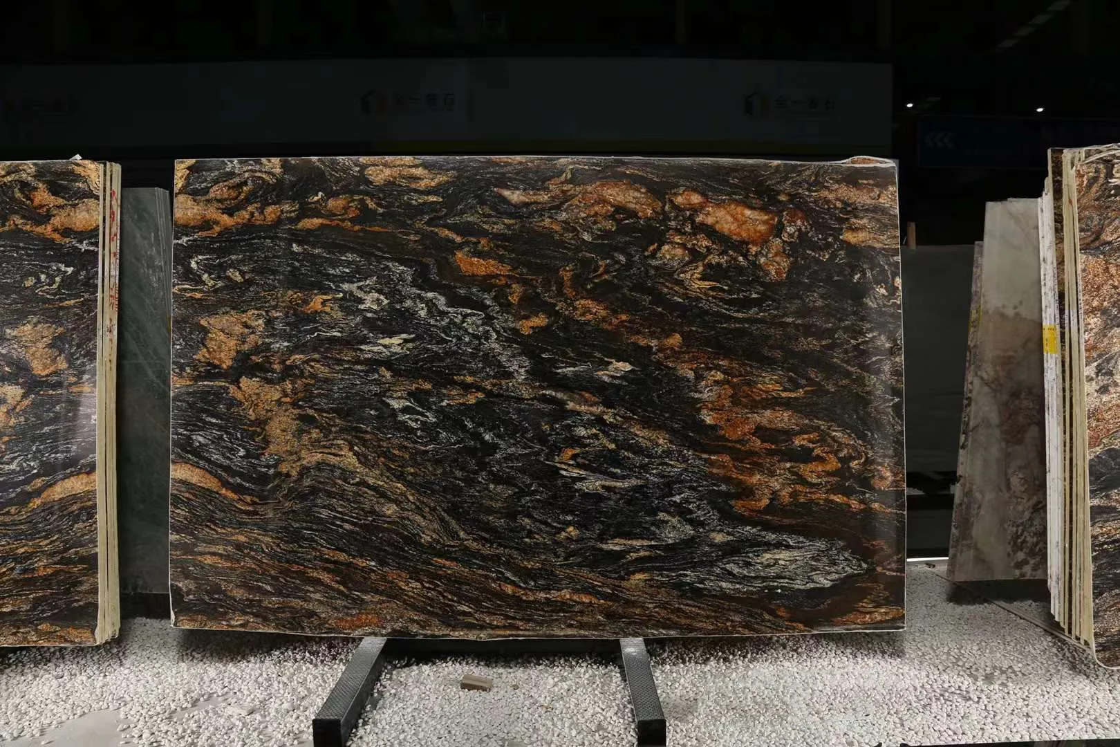 exotic cosmic black granite slabs with golden veins