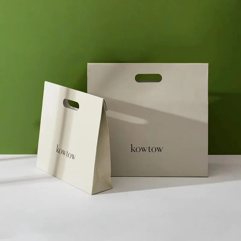 Luxury Die Cut Handle Shopping Bags With Hole Handed-Cut Kraft Paper Gift Bag Luxury Paper Shopping Bag