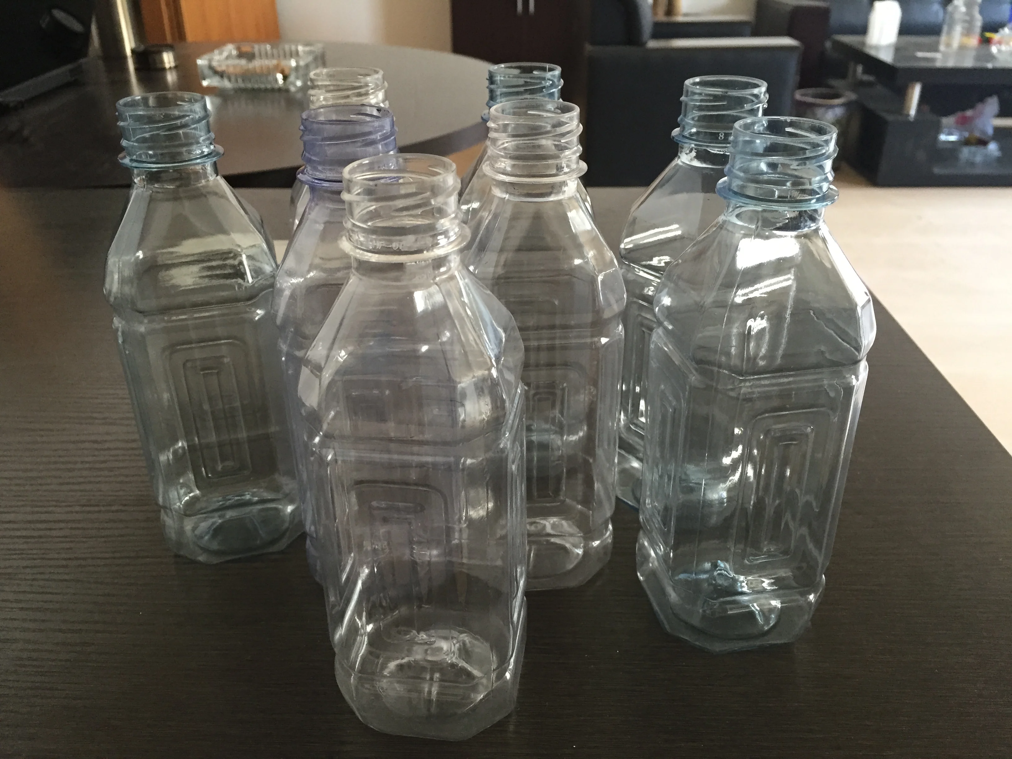 semi auto 4 cavity best price juice bottle blow molding machine