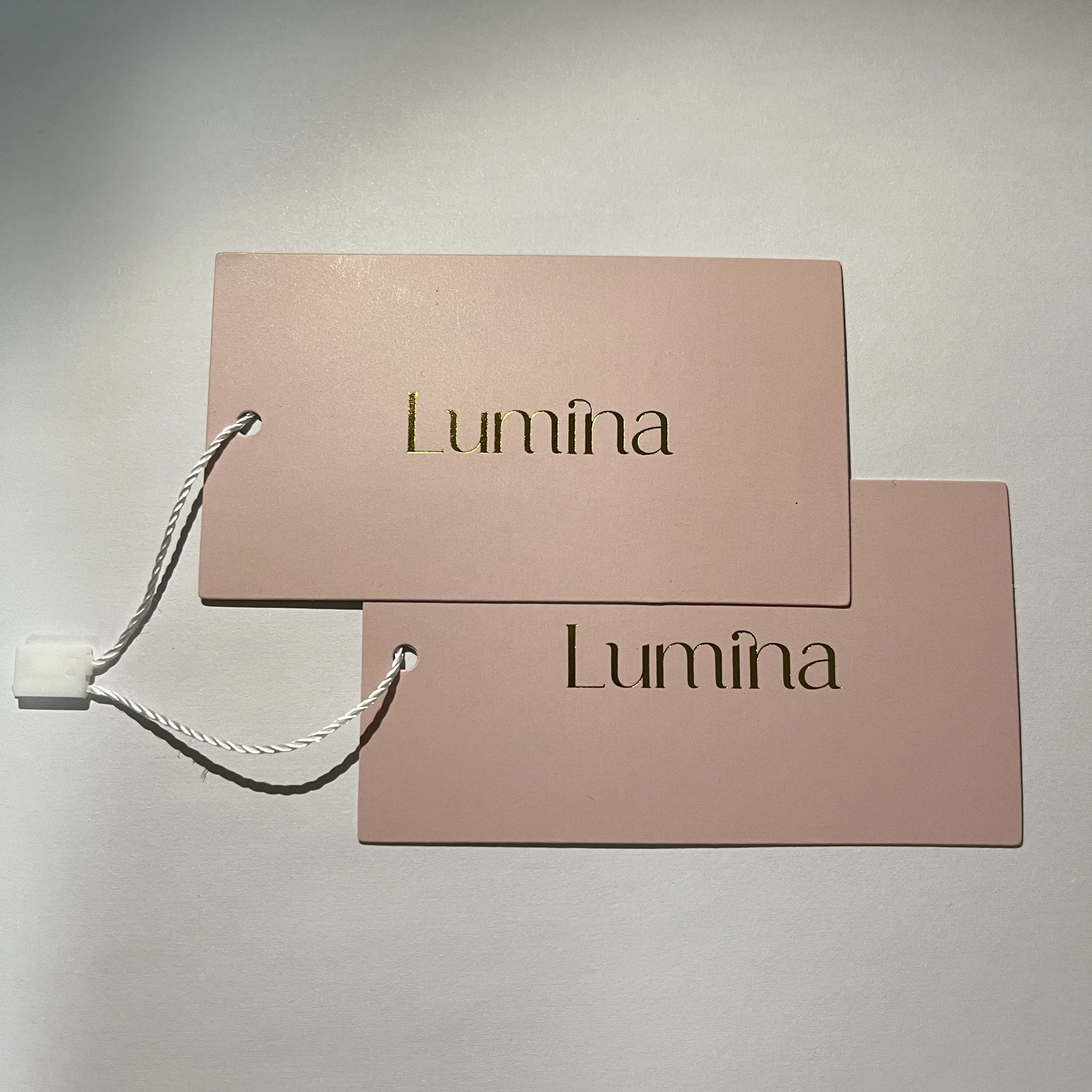 China high quality custom logo gold stamping die cut recycled jewelry thick hang tags with string for garments