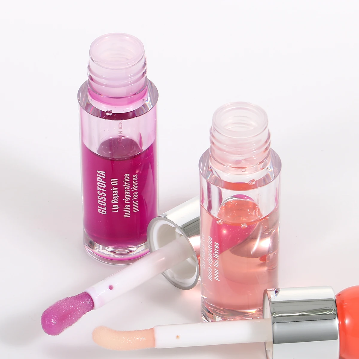 Wholesale  plump  pout  Oil Hydrates Lip Plumping Booster Gloss moisturizing Non-sticky lip oil gloss