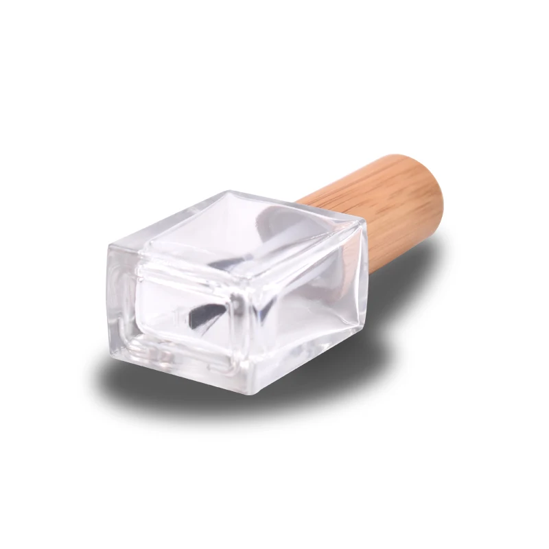 Luxury design Eco-friendly bamboo cap glass nail polish bottle supplier