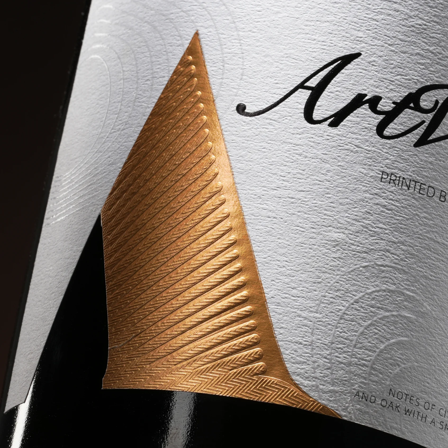 Custom Metallic Wine Stickers - Private Label Wine Labels with Gold Foil, Embossing, and Machine-Applied Adhesive Designs