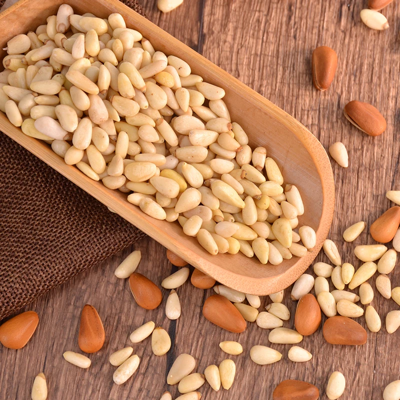 Ядра сосновых орехов без оболочки жареная Греция, орехи пекан