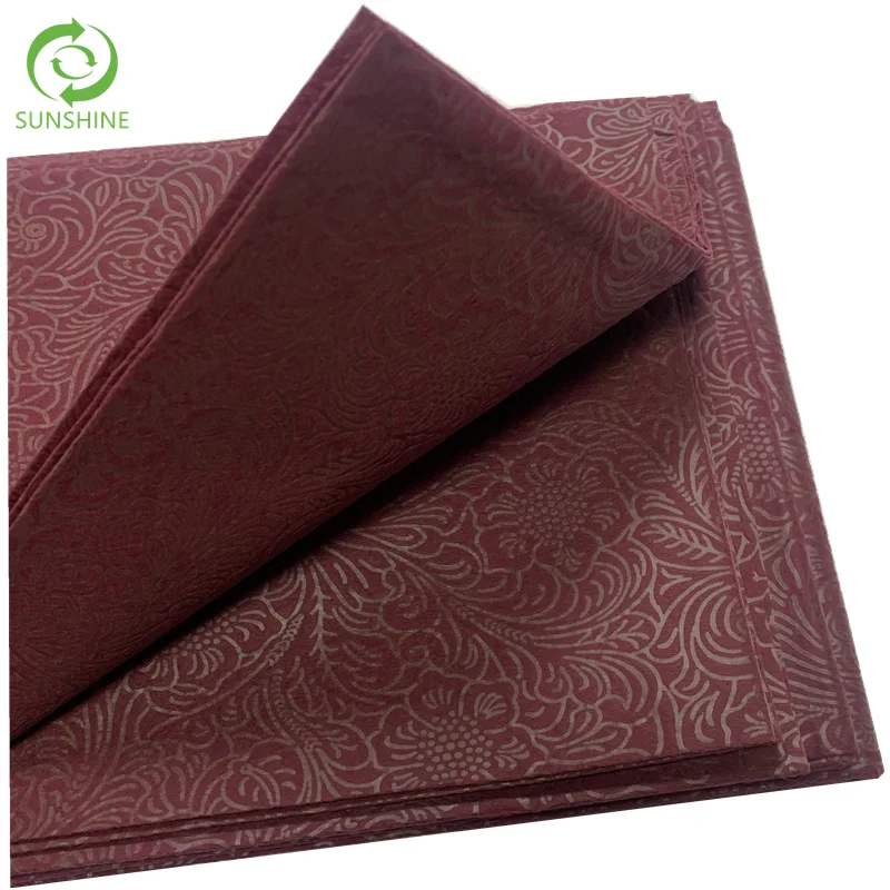 China 100% Polypropylene Embossed Spunbond Nonwoven Fabric TNT Fabric Roll Gift Box Colorful Packaging Paper