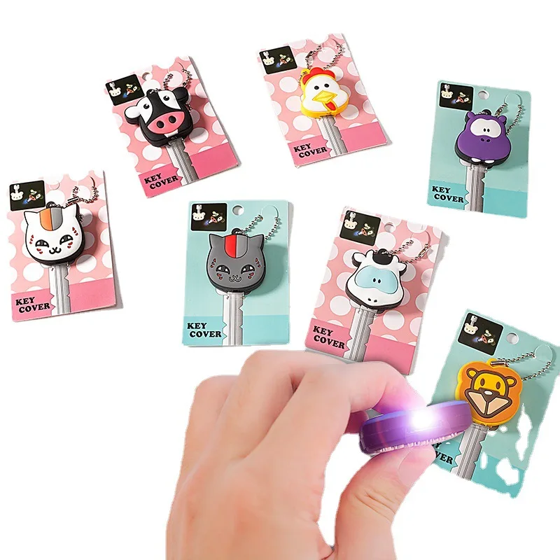 Free mock up factory price custom 3d embossed logo anime plastic rubber pvc silicone protector key head cover