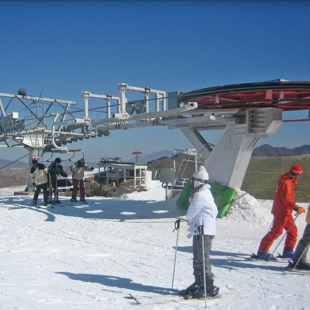 Ropeway chairlift with  four seats for four persons one chair  in ski resort ski area
