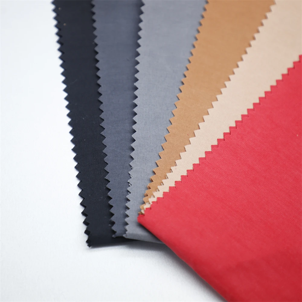 Wholesale ShaoXing Customized Nylon Polyester Composite 2/1 Twill Plain Brushed Peach Skin for Clothing