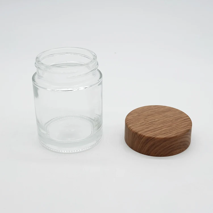 High-End Cylinder Straight Plastic Cap No Leak Heavy Duty Glass Bottle 750ML Clear Glass Jar Bottle With Wood Grain Lid