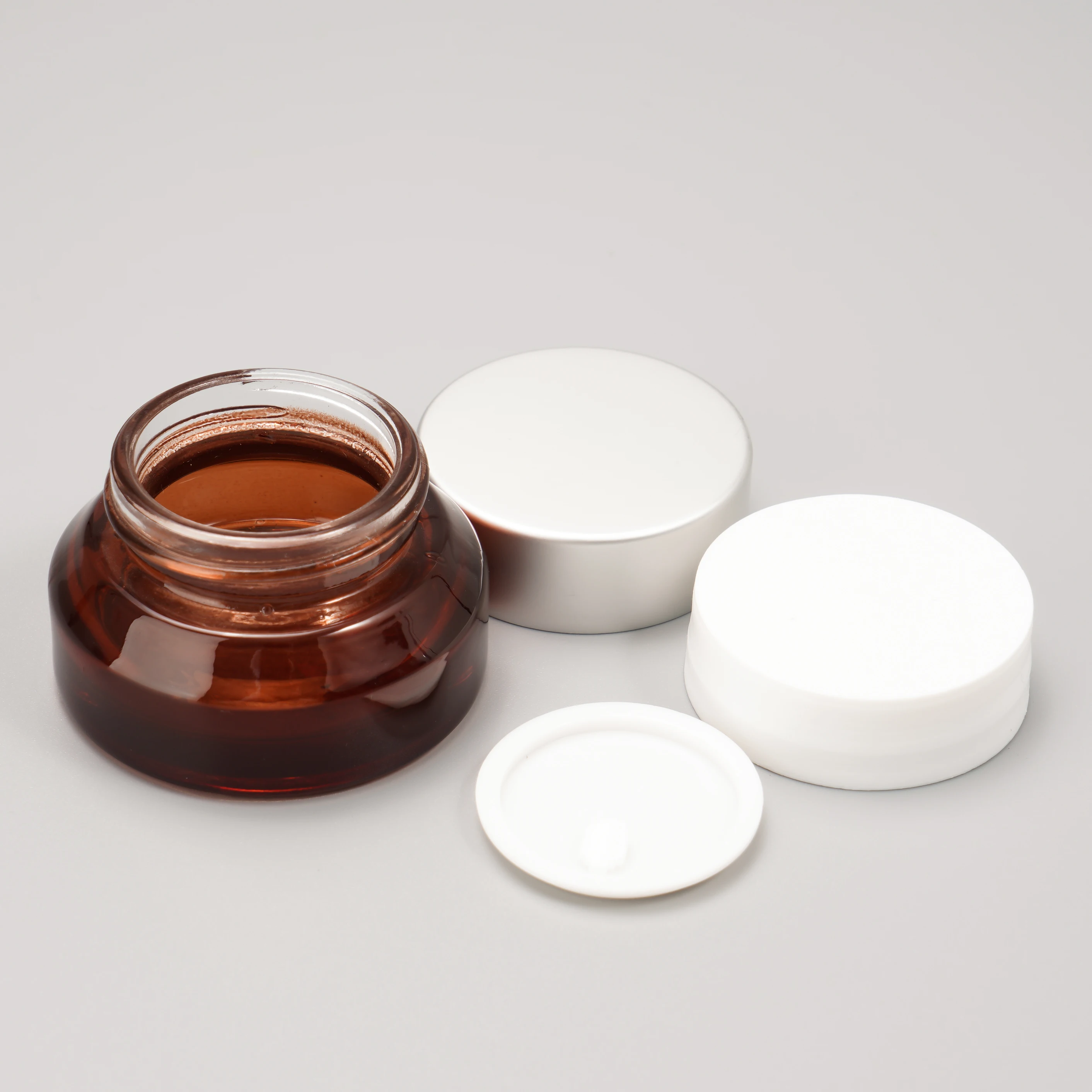 Wholesale ECO Friendly Reusable Jar for cream 1oz 2oz 30g 50g 100g Atter Shoulder UV Frosted Brown Clear Glass Cosmetics Jar 20g