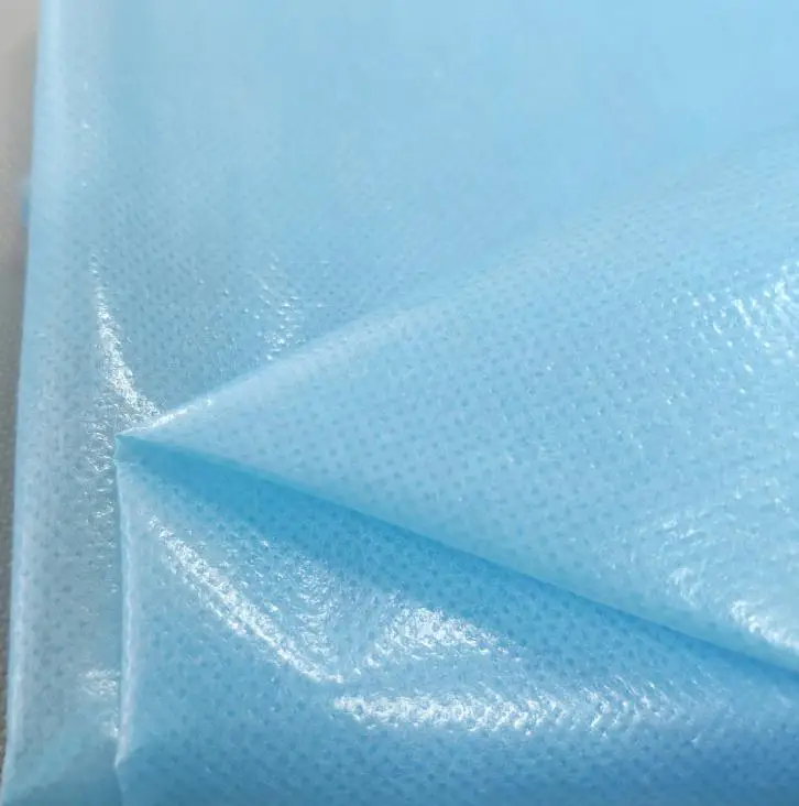 Waterproof PE PP laminated non woven fabric for protective gown apron
