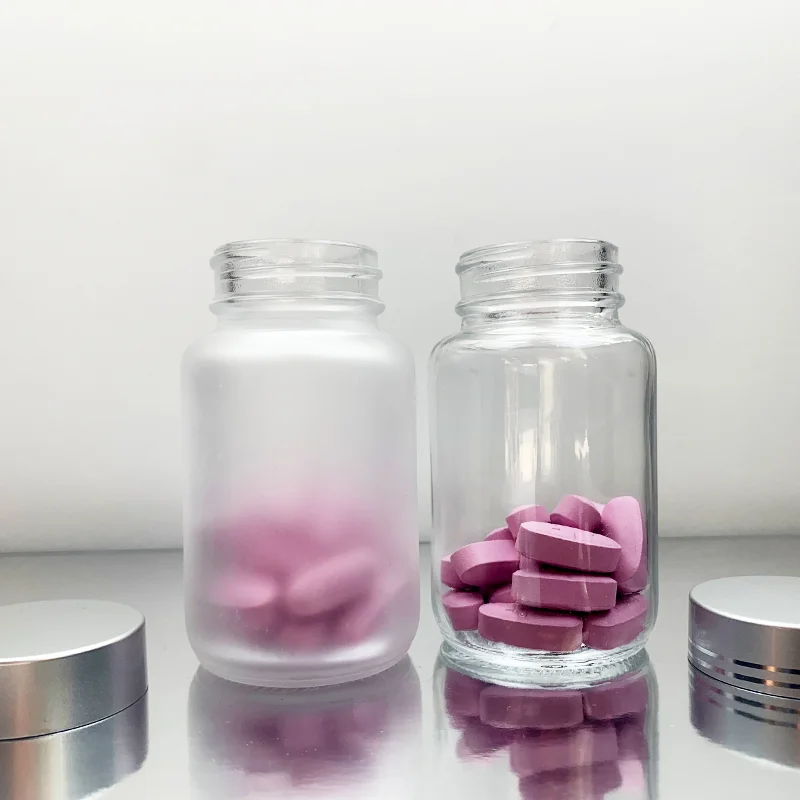 wholesale wide mouth capsule pill glass bottle health care product container clear frosted vitamin medicine screw aluminum lid