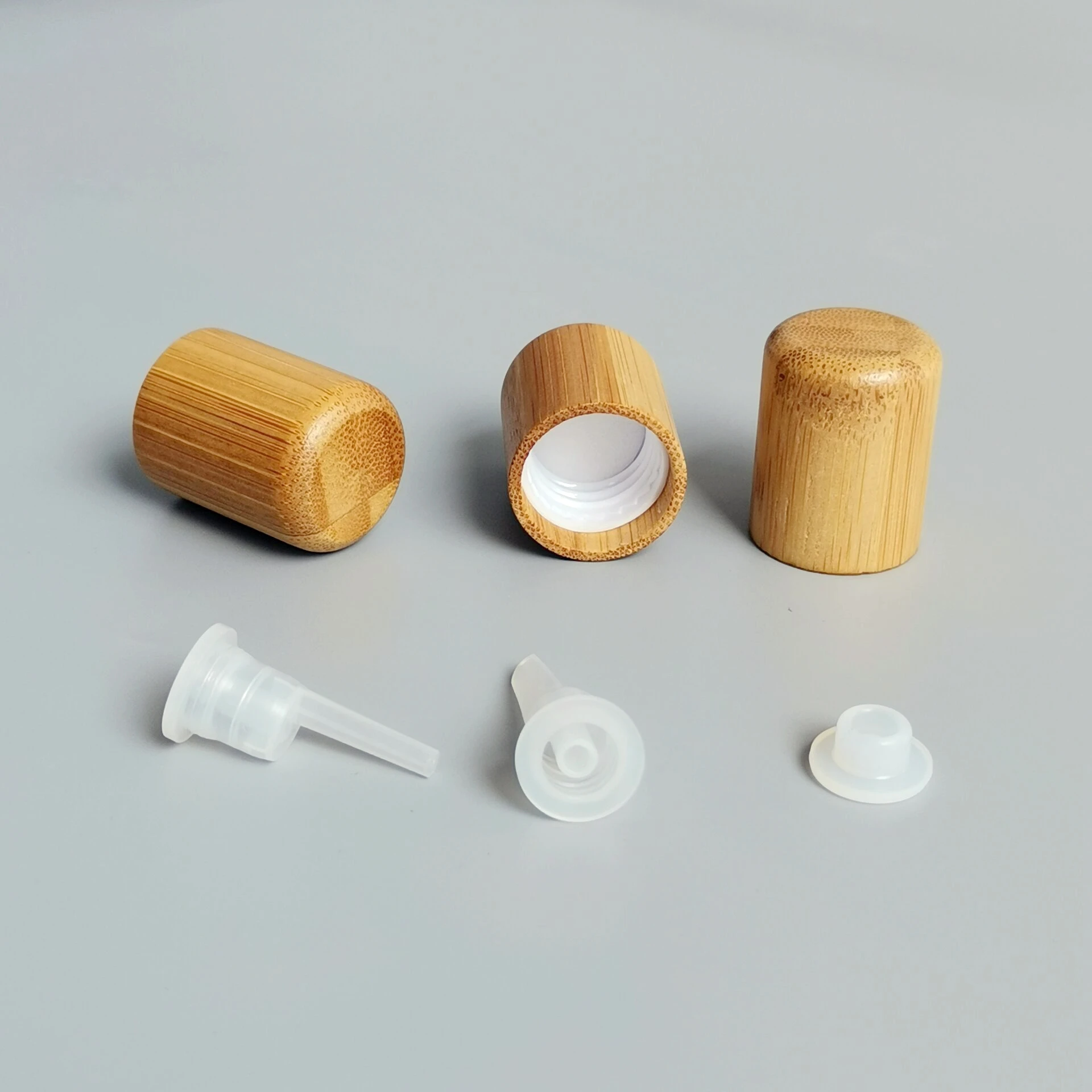 matte black glass bottles 100 ml glass essential oil bottles with 18 mm bamboo lid and drip plug for body massage oil